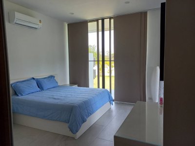 Beautiful pool villa on large land plot near Hua Hin city .