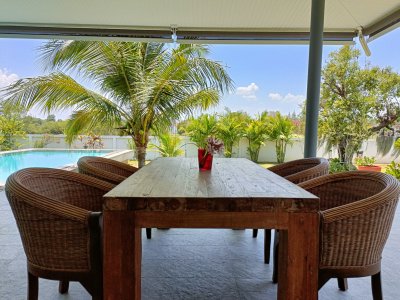 Beautiful pool villa on large land plot near Hua Hin city .