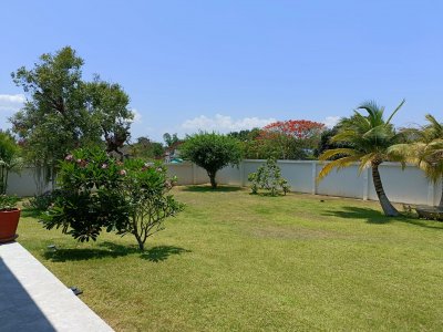 Beautiful pool villa on large land plot near Hua Hin city .