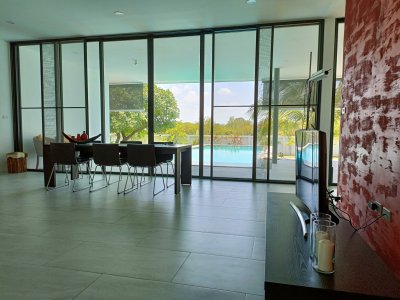 Beautiful pool villa on large land plot near Hua Hin city .